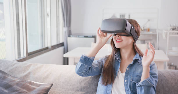 istock woman wear virtual reality headset 1014737518