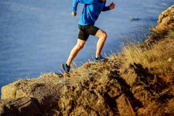 istock running on steep slope of mountain 1014737754