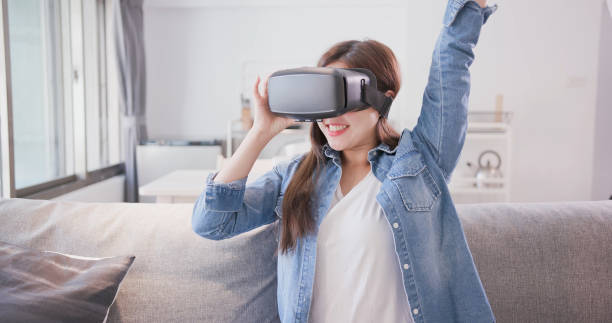 istock woman wear virtual reality headset 1014738544