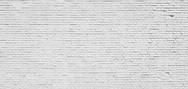 Background. Brick wall painted with white paint.