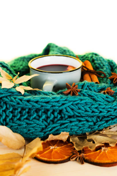 istock Autumn, fall leaves, hot steaming cup of glint wine 1014763700