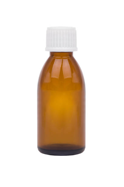 istock Brown medicine glass bottle isolated over white. 1014767534