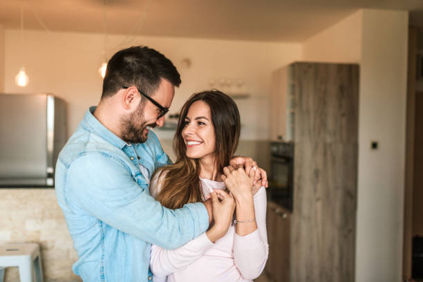 istock Loving young couple hugging. Close-up. 1014771040