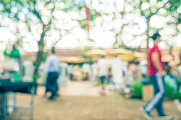 istock Blurred image of street market, split retro tone color effected 1014773864