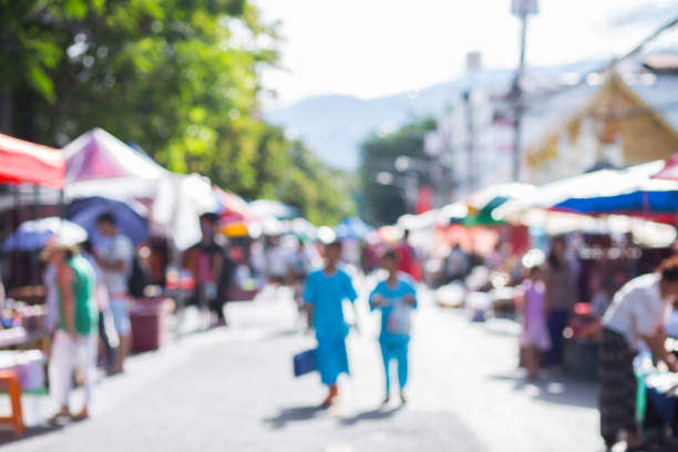 istock Blurred image of street market 1014775120