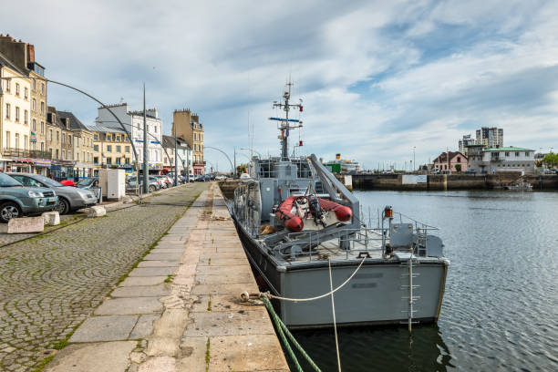 Cherbourg-Octeville, France - May 22, 2017: Boat in the port of Cherbourg-Octeville, Normandy, France. Cherbourg harbour is the biggest artificial harbor in the world.