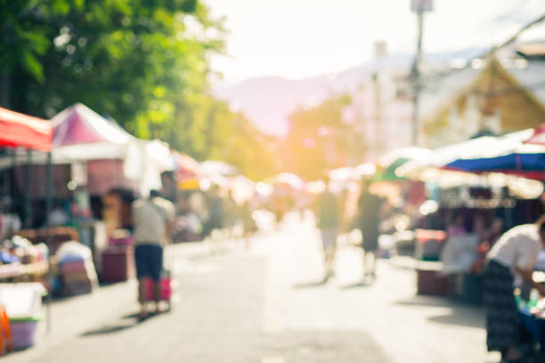 istock Blurred image of street market, split retro tone color effected 1014775520