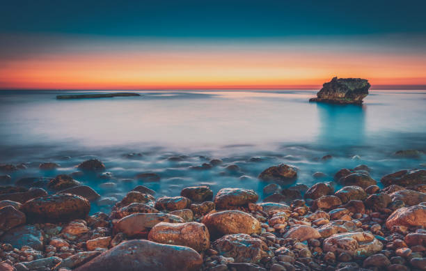 istock Beautiful sunset above sea 1014785362