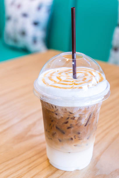 istock Ice caramel macchiato in plastic glass 1014796526