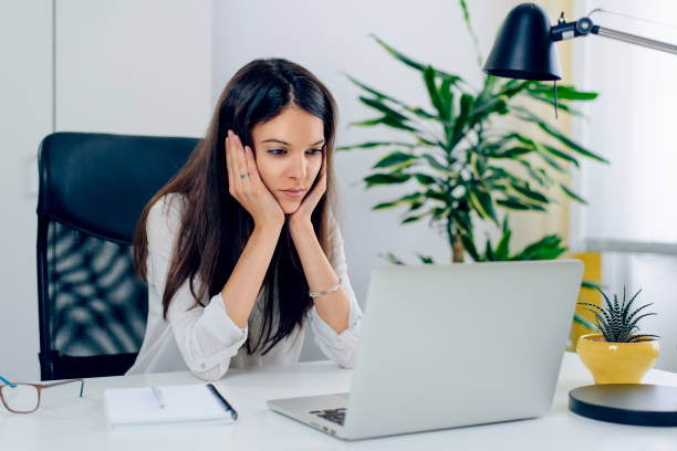 istock Business woman feeling totally burnt out 1014801366