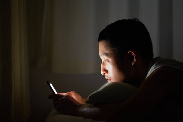 istock Night time and millenials with smart phone 1014806854