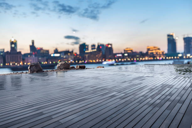 Wooden platform and Shanghai night view