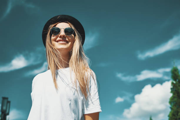 istock Happy young woman enjoying vacation 1014807326