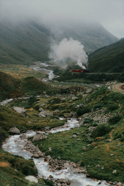 Scenic view of steam locomotive in Furka Pass, Switzerland
