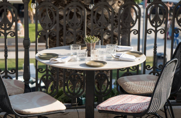 istock Served table for four persons in restaurant at summer. 1014813552
