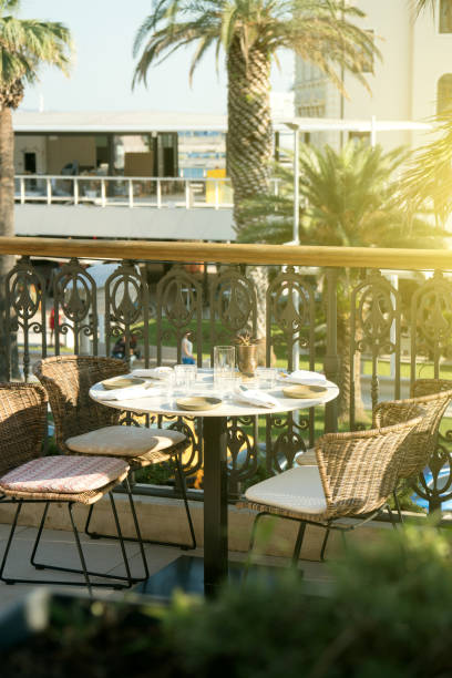 istock Served table for four persons in restaurant at summer. 1014813576