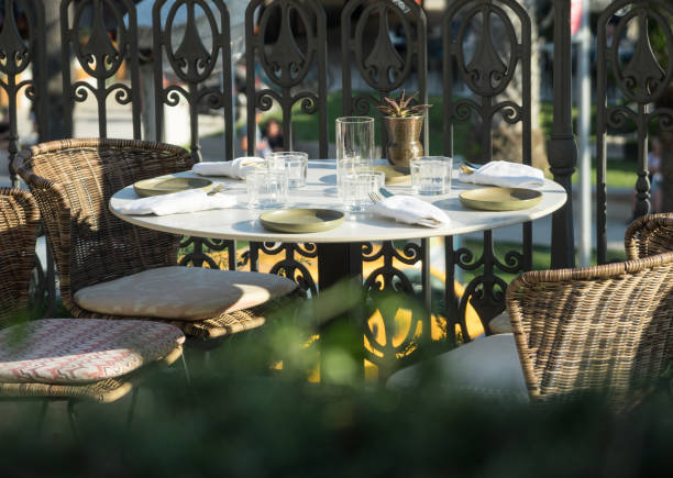 istock Served table for four persons in restaurant at summer. 1014813594