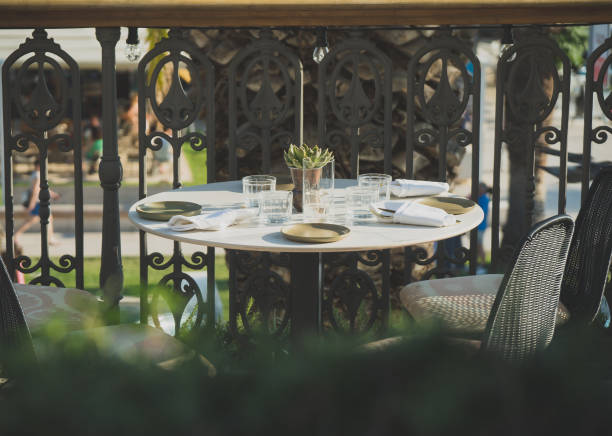istock Served table for four persons in restaurant at summer. 1014813648