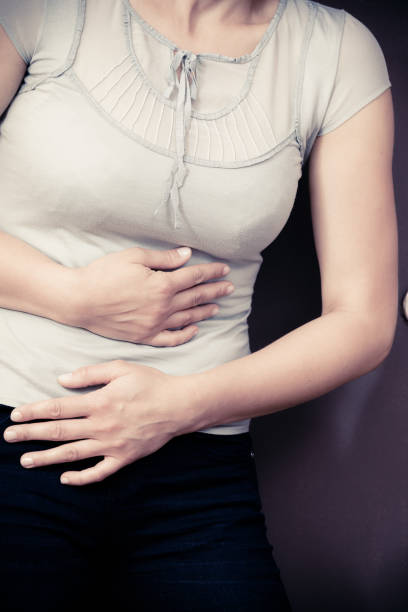 istock Woman feel pain ache 1014837566