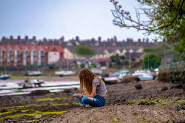 istock Teenager on beach 1014843132