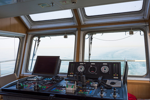 Various instruments and equipment in the bridge of a modern ship