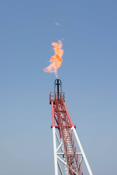 istock Flare boom on offshore oil rig. 1014847436