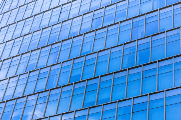 istock Bottom up view of Modern office building in Shenzhen, China 1014848170
