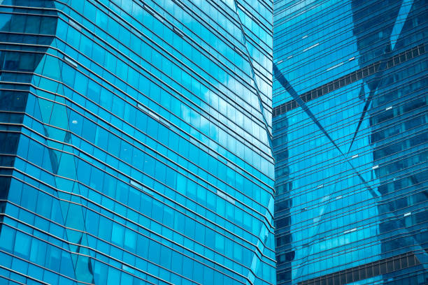 istock Bottom up view of Modern office building in Shenzhen, China 1014848180