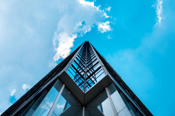 istock Bottom up view of Modern office building in Shenzhen, China 1014848230