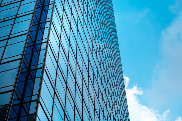 istock Bottom up view of Modern office building in Shenzhen, China 1014848234