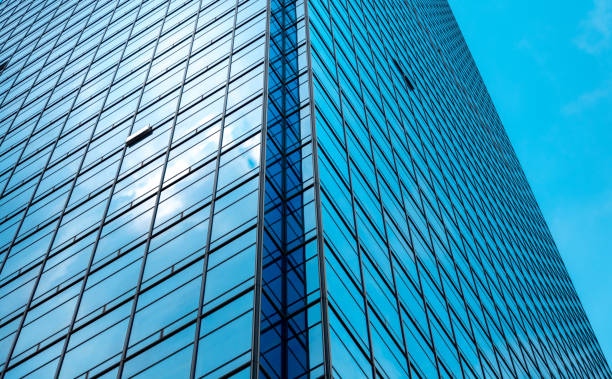 istock Bottom up view of Modern office building in Shenzhen, China 1014848264