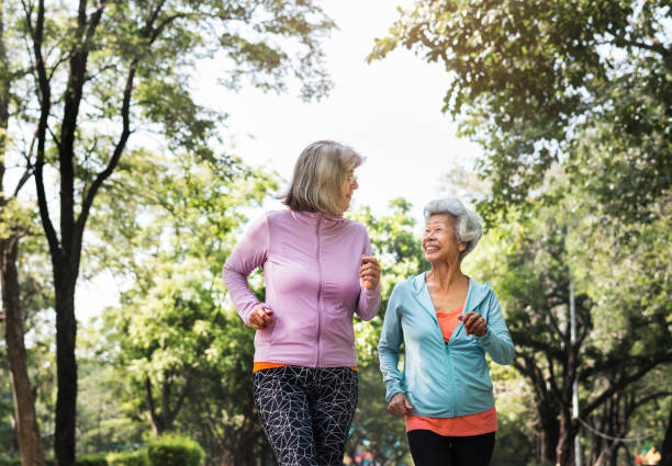 istock Senior friends exercising outdoors 1014851572