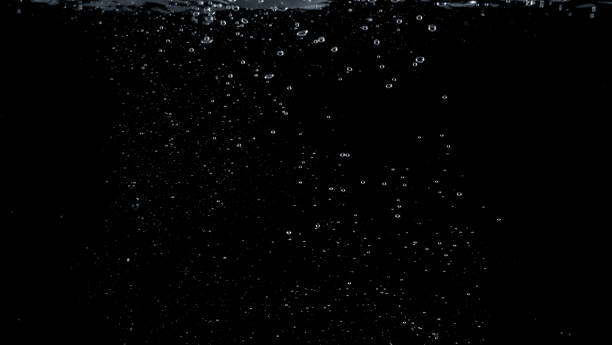 ソーダ水は、多くの小さな泡を水の中で水しぶきのクローズ アップ イメージがさわやかな感じ - oil boom ストックフォトと画像