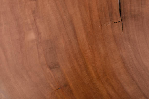 istock dark wood planks background 1014858360