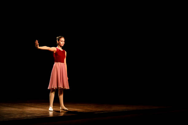 istock Young girl dancing ballet 1014875814