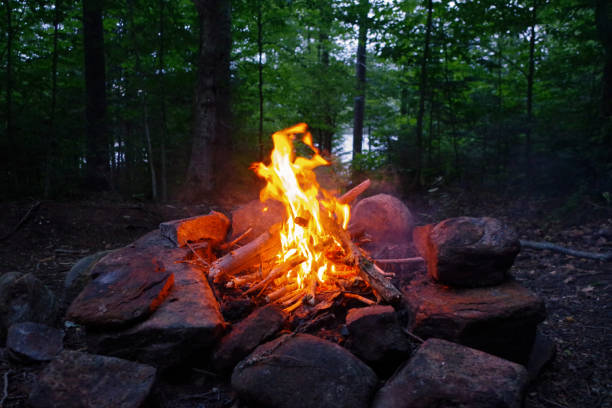 Campfire at camp in the Adirondack Mountains of Upstate New york. stock photo