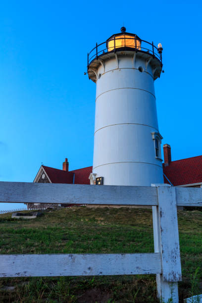 istock Close up of Nobska Lighthouse at dusk 1014881040
