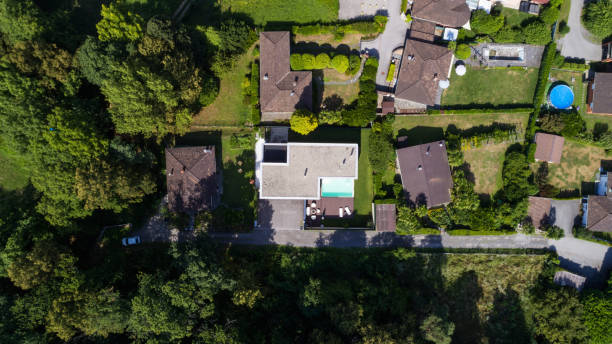 istock Exterior modern white villa with pool and garden 1014883770
