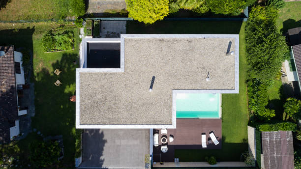 istock Exterior modern white villa with pool and garden 1014883852