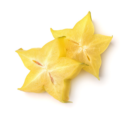 Two carambola slices isolated on white