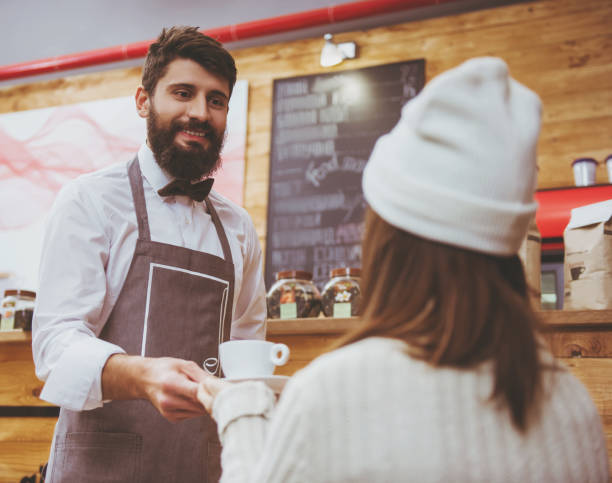 istock Hipster Barista Gived Cup of Coffee. 1014888042