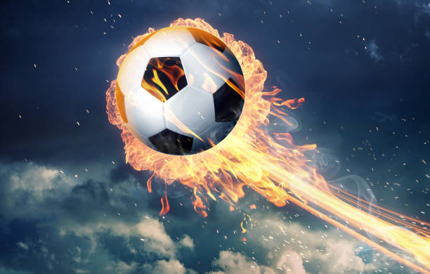 istock Soccer ball in fire flames 1014897366