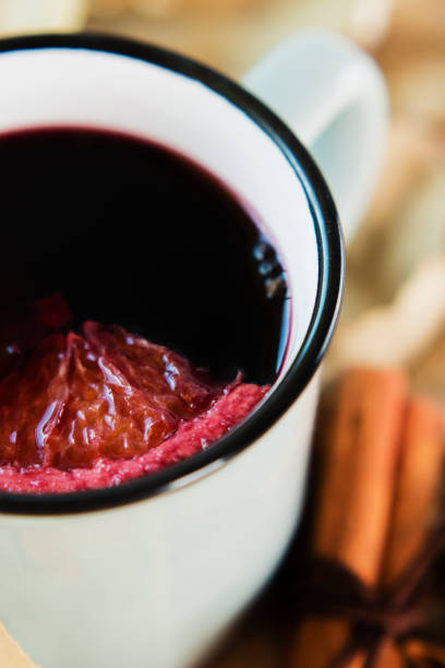 istock Autumn, fall leaves, hot steaming cup of glint wine 1014898354