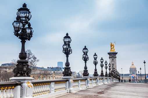 PARIS, FRANCE - MARCH, 2018: The Pont Alexandre III in a freezing winter day in Paris