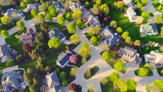Beautiful neighborhoods, homes, aerial view in Summertime.