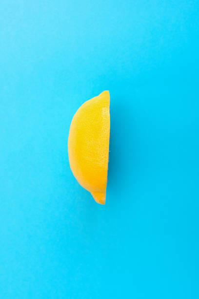istock Cut in half piece of yellow lemon 1014925226