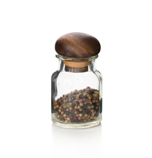 istock Bottle glass pepper on isolated white background 1014929752