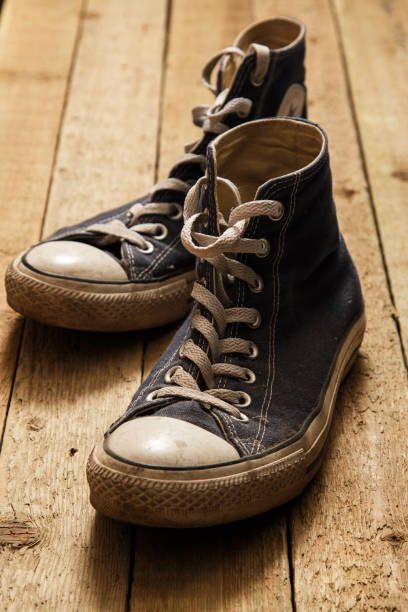 istock Gumshoes on wooden background 1014930320