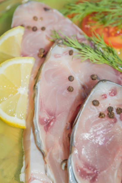 istock Raw fresh fish carp steaks with spices before cooking 1014933498