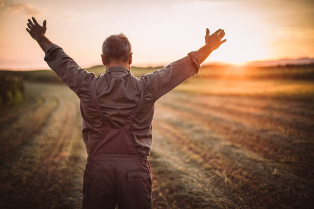 istock Farmer in field . Freedom 1014933812